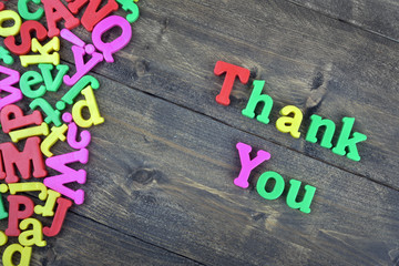 Thank you on wooden table