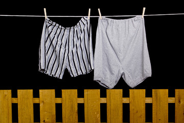 Men's underwear hanging on a clothesline