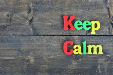 Fototapeta premium Keep calm on wooden table