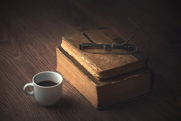 Cup of coffee on sackcloth a wooden