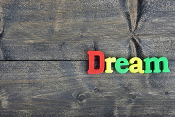 Fototapeta premium Dream on wooden table