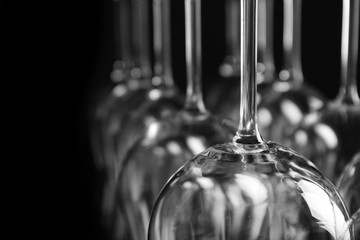 Empty wine glasses on black background, closeup
