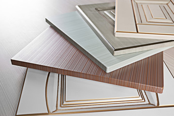Obraz premium Samples of wooden panels for furniture and door on light table
