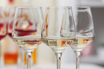 Wine glasses with red and white wine, closeup