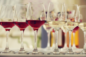 Wine glasses with red and white wine, closeup