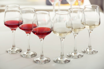 Wine glasses with red and white wine, closeup