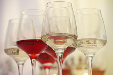 Wine glasses with red and white wine, closeup