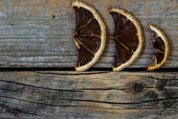 Fototapeta na wymiar dried citrus on a beautiful wooden background