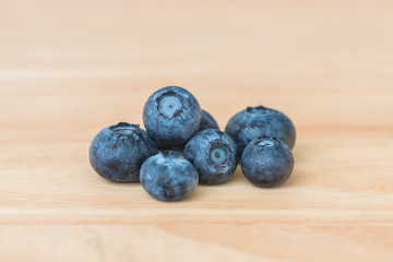 Blueberry on wooden table background