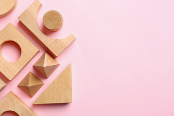 Children toys on pink background