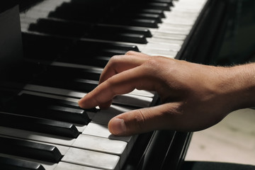 Fototapeta na wymiar Musician hands playing piano