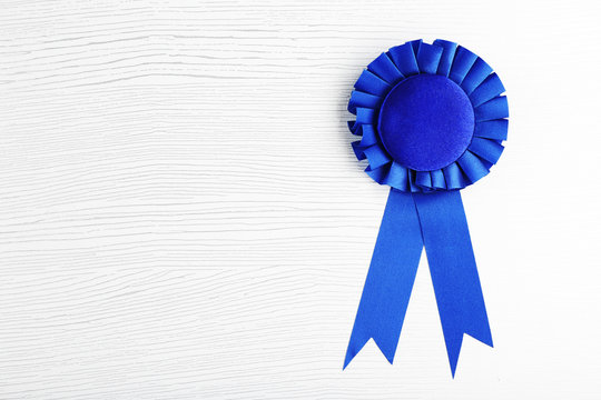 Blue Award Prize Ribbon On Grey Background