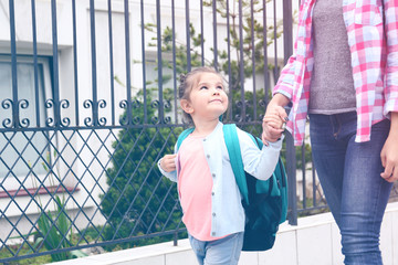 Parent taking child to school
