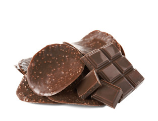 Chocolate chips and pieces on white background