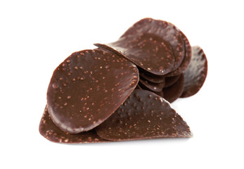 Chocolate chips on white background