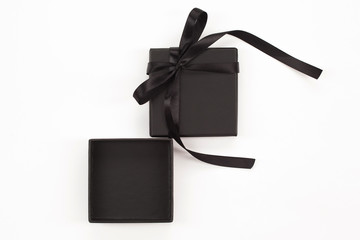 Open jewelry box on white background