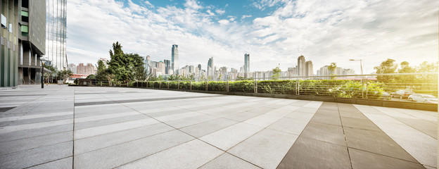 empty floor with cityscape and skyline of chongqing in clous sky