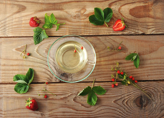 mug with herbal tea of strawberries and strawberry