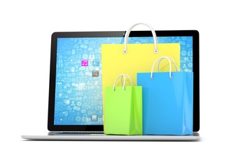 laptop and  shopping pags on white background. 3d rendering.