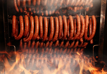 Delicious homemade sausage in the smokehouse