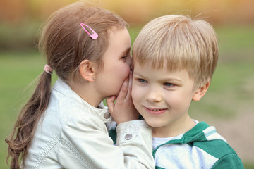 boy and girl playing outside