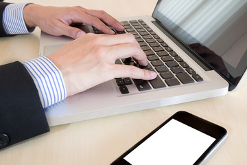 businessman hand typing with white screen smart phone