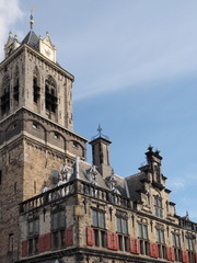Fototapeta premium Delft, Netherlands - July 6, 2016: Architectural detail of the medieval town hall in the city of Delft.