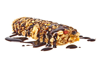 Healthy cereal bar with chocolate on a white background