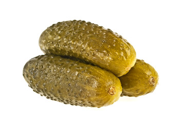 Pickled cucumbers on white background