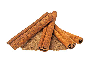 Cinnamon sticks and powder on white background