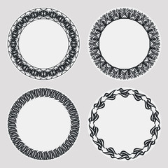 Set of silhouette round frames with floral elements. Design element for  logo, banners, labels, prints, posters, web, presentation, invitations, weddings, greeting cards, albums. Vector clip art.