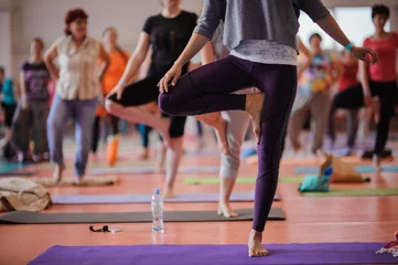 Door stickers Yoga school Women practicing yoga at health club