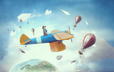 Girl flying old plane . Mixed media