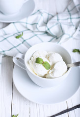 Vanilla ice cream in white bowl