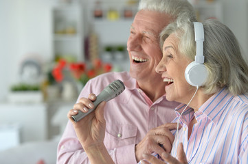Senior couple with headphones