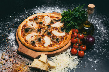 Tasty pizza on black background