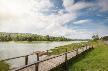 Naklejka premium Wooden bridge across flood area of big lake