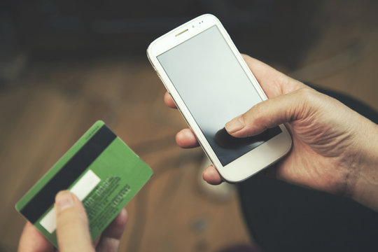 woman hand card and phone