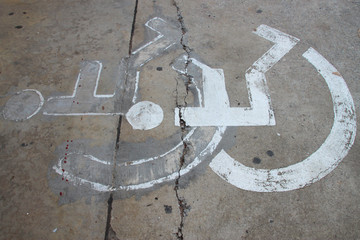 patient wheelchair sign on parking floor