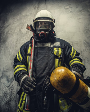 Portrait of firefighter in safety uniform.