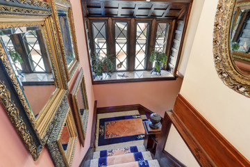 Great panoramic view from upstairs. Vintage style house interior.