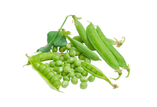 Several green peas and several pods of peas