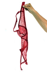 Femme tenant un soutien-gorge