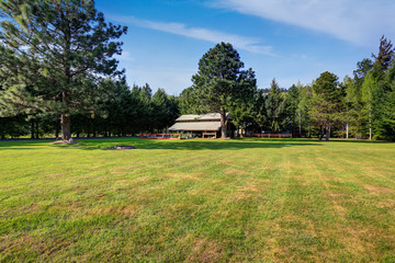 Fototapeta na wymiar American country house with impressive backyard landscape