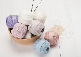 Thread Bobbins in a Wooden Bowl