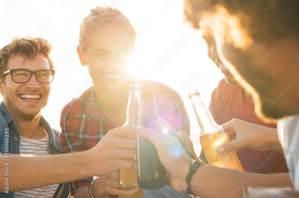 Wall mural friends toasting with beer