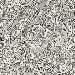 Cartoon hand-drawn doodles music seamless pattern