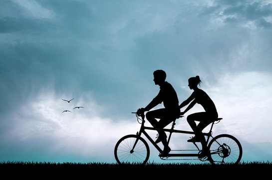 couple silhouette in tandem