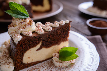 Piece of chocolate cheesecake with whipped cream
