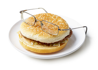 Amusing sandwich in spectacles isolated on a white background
